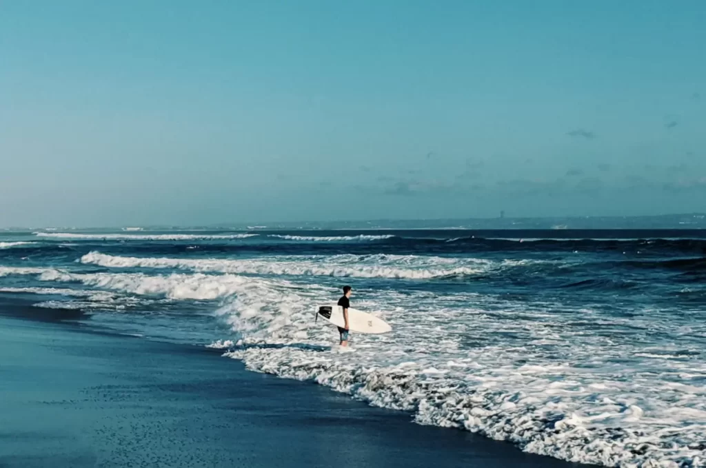surfing in canggu beach