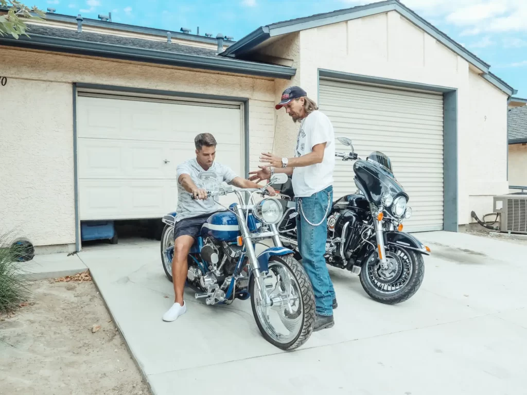 People are checking the motorbike condition
