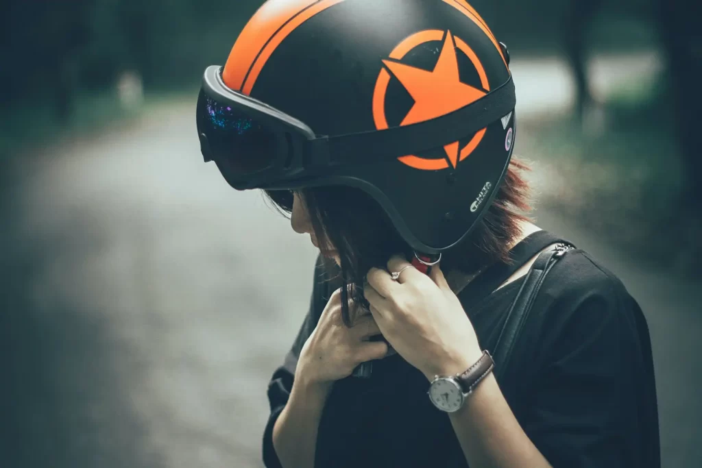 Wearing helmet before ride motorbike
